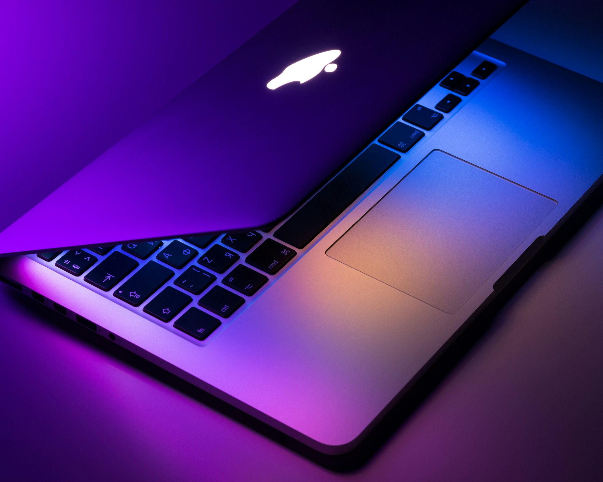 Silver MacBook Pro on a desk, illustrating the 14-inch M6 refresh window